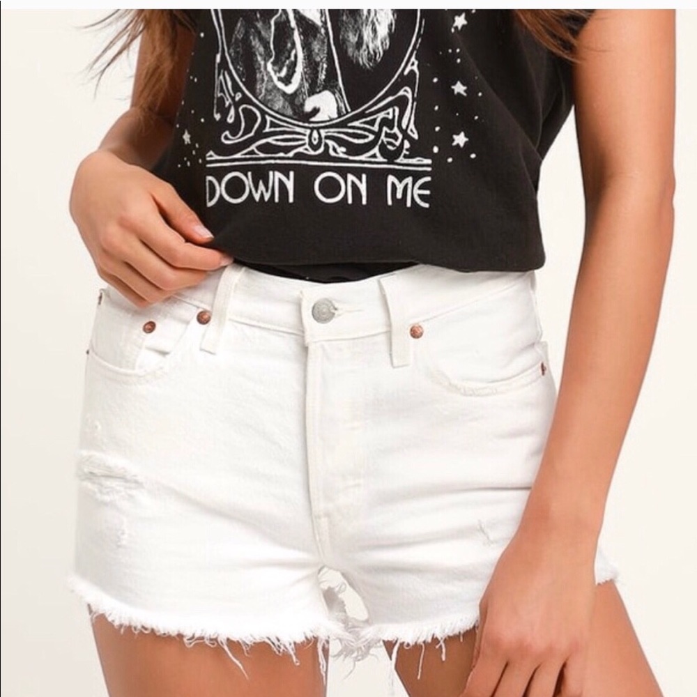 Levi’s 501 distressed white denim shorts